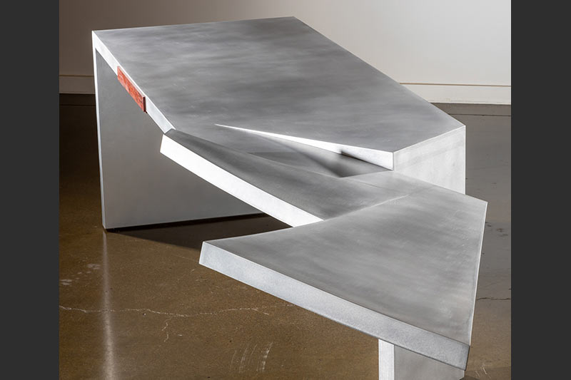 Charles Jones designed and built a torn-form aluminum table for the 2019 PowerGen conference held in New Orleans, LA.
