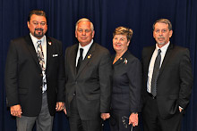 Rep. Gene Green (D-TX 29th), second from left, with IVP J. Tom Baca, Helen Green, and Mark Thompson, Local 132.