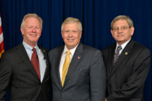 West Virginia Auditor Glen Gainer III, center, with IP Newton Jones, left, and B.B. Smith, Local 667 (retired).
