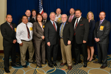 Rep. Ron Barber (D-AZ-2nd), fifth from left, with International officers, International staff, and local lodge delegates. L. to r., front row, Tyson Tullie, L-4; Louis Dodson, L-4; Celia Lowrey, L- 627; IP Newton Jones; IVP J. Tom Baca; D-PA Bridget Martin; and Wes Hevener, L-627. Back row, l. to r., Jacob Evenson, L-627; Gary Aycock, L-627; IST Bill Creeden; ED-CSO Kyle Evenson; and D-CRS Gary Evenson.