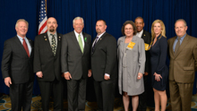 House Democratic Whip Steny Hoyer, third from left, and l. to r., IP Newton Jones; Mike Herd, L-193; Dan Weber, L-193; Alonna Morris, L-S50; Hudson Hart, L-S50; Bridget Martin, D-PA; and retired L-193 BM-ST Ernie Dorsey.