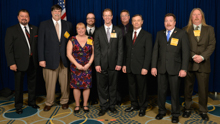 Rep. Derek Kilmer (D-WA-6th), center, with IVP J. Tom Baca, far left, and delegates from L-104 and L-290.