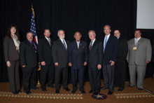 Rep. John Conyers (D-MI 13th), center, with IP Newton Jones, fourth from right; IVP Larry McManamon, third from right; IST Bill Creeden, fourth from left; and the L-169 delegation.